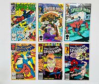 Six Spider-Man comic books bagged and boarded, showing front covers with dynamic action scenes, Marvel branding, and typical comic book style numbering and pricing.