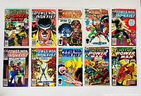 Ten freshly bagged and boarded Power Man and Iron Fist comic books arranged in two rows of five.