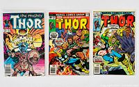 A group of six Thor comic books from Marvel Comics Group, showing front covers with colorful artwork and heroic poses. Comics are bagged and boarded.