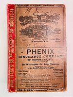 Front board showing printed advertisements for Darling & Curry architects, The Gutta Percha & Rubber Mfg Co. and Phenix Insurance Co.