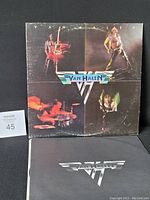 Front cover of the Van Halen vinyl record jacket featuring four band members and logo.