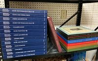 Stack of Beethoven Bicentennial Collection music scores in blue hardcover with titles visible on spines.