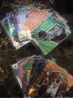 Prizm parallels and inserts with holographic and mosaic reflective patterns showing Darius Garland and Chicago Bulls cards.
