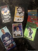 NHL hockey card lot with a variety of cards including rookies, inserts, and player cards featuring Sidney Crosby, Patrick Kane, and others shown with holographic and foil finishes.