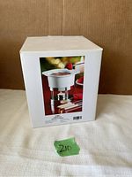 White box packaging showing the mini fondue set image and details on the label.