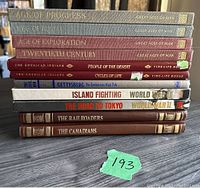 Stack of 11 Time Life books from five series: Great Ages of Man, The American Indians, World War II, The Railroaders, The Canadians. Titles visible on spines.