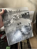 Close-up photo of one book showing a black and white photo of soldiers in a war setting on cover.