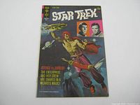 Front cover of the 1971 Gold Key Star Trek No.10 comic book showing title, price, and cover art with Enterprise crew and wizard theme.