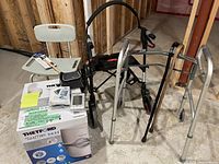 Shower chair, walkers, canes, Bios blood pressure monitor, Thetford Porta Potti box