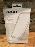 Front of Tech21 iPhone X case package showing clear case image and BulletShield impact protection badge