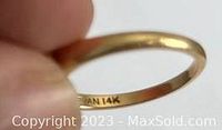 Close-up photo of the inside band of the ring showing the '14K' hallmark.