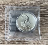 2015 Bugs Bunny $20 Fine Silver coin in original sealed plastic packaging showing the coin front with Bugs Bunny profile and date.