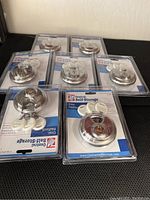 Seven Central Self Storage disc padlocks in original packaging, each with two white keys.
