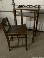 Photo of telephone table and chair set showing the overall condition and design.
