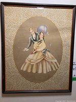 Full view of the Brewster lithograph print in frame with lace mat.