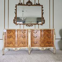 Full view of dresser and mirror arranged together against wall