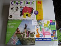 Photo showing the complete lot including Crazy Forts box with 69 pieces, Ring Toss game set box, and Balloon Modelling kit box