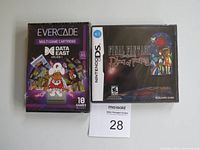 Photo showing Evercade Data East arcade multi-game cartridge and Nintendo DS Final Fantasy Ring of Fates game case, both shrink-wrapped and new.