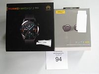 Boxed Huawei Watch GT 2 (46mm) alongside boxed Jabra Elite 85t earbuds