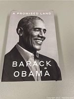 Front cover of the book showing the portrait of Barack Obama with title and author name.