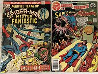 Photo of two comic books: Marvel Team-Up #17 with Spider-Man and Mister Fantastic, DC Comics Presents #47 with Superman and Red Tornado