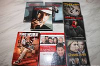 Photo of all DVD cases showing titles and cover art for known TV show seasons in the lot