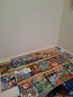 20 Geronimo Stilton books laid out showing front covers and spines with maxsold lot tag.