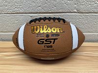 Photo of one Wilson GST 1780 football showing front logo and branding.