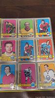 Image showing 9 hockey cards from 1972-73 Topps set, with players from teams like Los Angeles Kings, Philadelphia Flyers, and Buffalo Sabres.