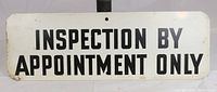 Front of the rectangular enamelled metal sign showing black lettering on cream background stating 'INSPECTION BY APPOINTMENT ONLY'.