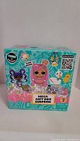 Front view of the LOL Surprise Mega Gift Box showing colorful packaging with doll and pet characters.
