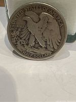 Close-up image of the coin showing the eagle and inscriptions.