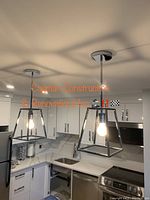 Pendant light fixtures installed in modern kitchen