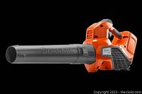 Orange and black Husqvarna 320iB cordless leaf blower on black background