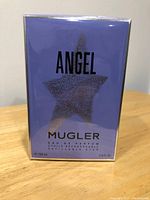 Front view of sealed Angel by Mugler 100ml Eau de Parfum box showing product branding and volume.