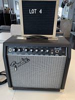 Front view of Fender Frontman 15R guitar amplifier showing control panel with knobs and input ports.