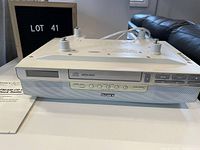 Sony FM/AM CD Kitchen Clock Radio viewed frontally showing buttons, display, and speaker grille in cream blue color.