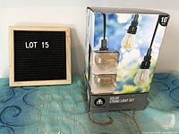 Full view of unopened Hometrends Solar String Light Set box showing product image and key details.