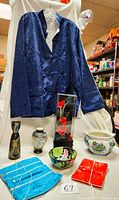 Vintage mid-century Moriage porcelain dragon vase shown with other items including clothing and ceramics