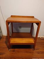 Full view of the wooden bar cart showing structure and design