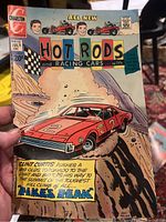 Front cover of Hot Rod Comic Number 69, July 1964, showing racing car on a dusty hill climb scene.