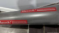 Rolled acoustic pad with clear Husssh! Superior Acoustic Pad branding label visible on the side.