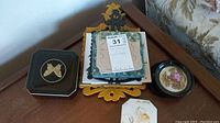 Tabletop showing all trivets and coasters included in the lot.