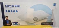 Box front showing Dr. Oz branding, product name, and main features on pillow packaging.