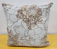 Front view of the decorative throw cushion showing full floral embroidered pattern.