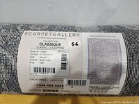 Close-up of label showing brand ECARPETGALLERY Classique Collection, quality Tabriz, color Blue/Grey, size 80x250 cm, design AG13A-ORG81.