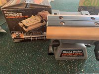 Black & Decker Workmate bench top work center with original box, showing the product in use for hobby crafting.