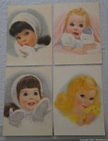 Four Frances Hook advertising prints arranged in 2x2 grid, showing illustrated little girls with expressive eyes and winter-themed clothing.