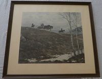 Framed western-themed print showing horse-drawn wagon and riders on horseback on a snowpatch hillside.