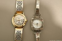 Side-by-side image of a Cairn Celtic watch with intricate band design and a silver handmade watch with safety chain and mother-of-pearl face.